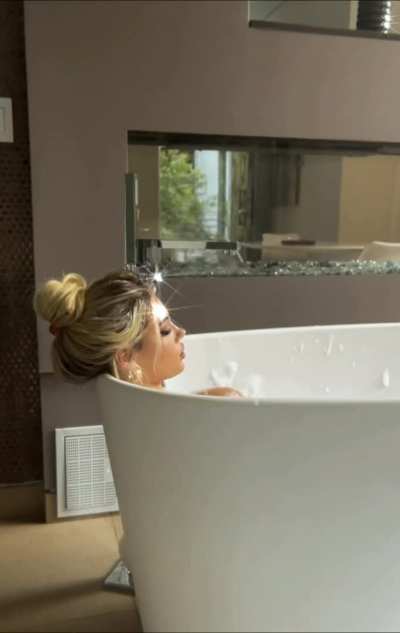 Elegant Lady in Bathtub