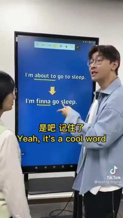 Zhongguonian attempting to teach English to his pupils