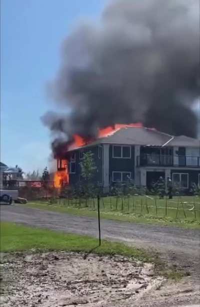 House fire reaches 400 pound propane tank