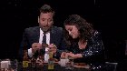 Selena eating hot wings