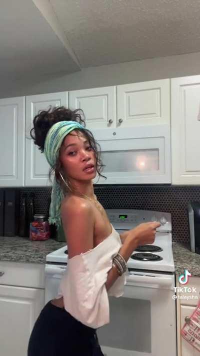 Tai'aysha in another attempt at wearing a shirt