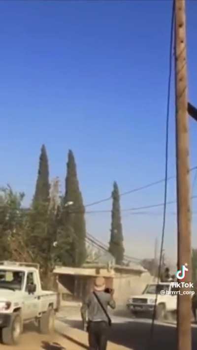 Free Syrian Army soldiers cheer as an A-10 strafes ISIS