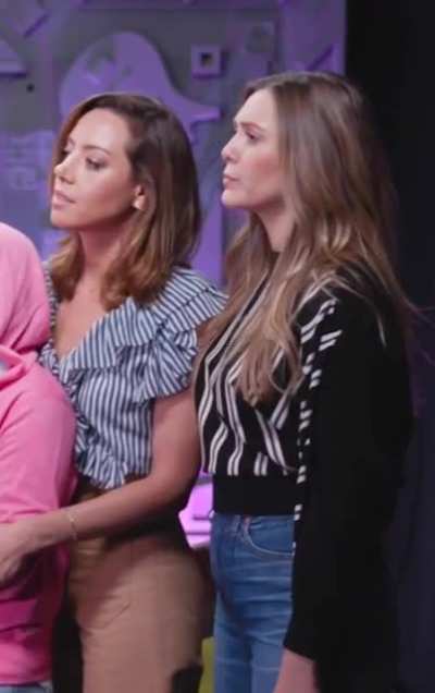 Elizabeth Olsen gives Audrey Plaza a spank