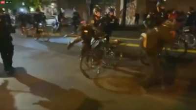 Seattle police roll bike over protesters neck - 23rd September