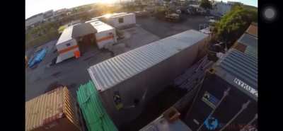 Guy attempts parkour jump but doesn’t quite make it