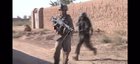 Marines and ANA assault a building in Helmand Province, Afghanistan.