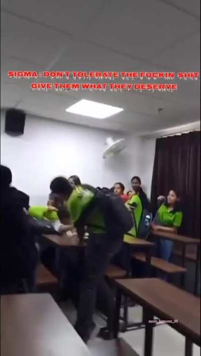Bruh had a belt and still lost XDDDD. [Green shirt guy was stopped by grey shirt guy (not the one was gettin beaten up well he has white shirt) because when he was betting the guy with belt ,white shirt guy belt accdentally hits one of the girl]