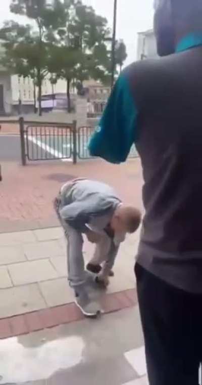 Getting his ass kicked by a guy with one hand