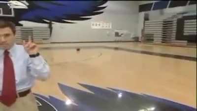 Reporter in basketball stadium
