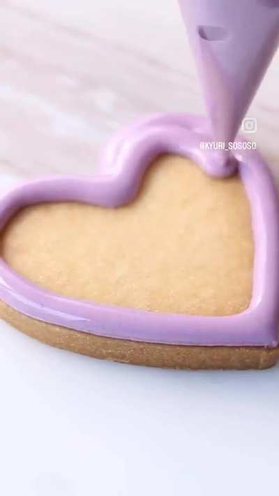 Icing heart cookies