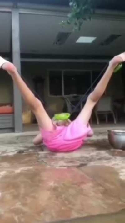 Water balloon foot catapult results in wet nuts