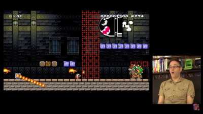 Angry video game nerd beating one of his daughters mario maker levels.