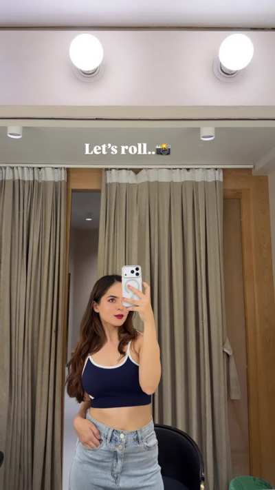 Palak Sindhwani in Navy Blue and White Trim Crop Top with Light Blue High-Waisted Denim Jeans