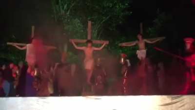 Audience member tries to save Jesus from crucifixion