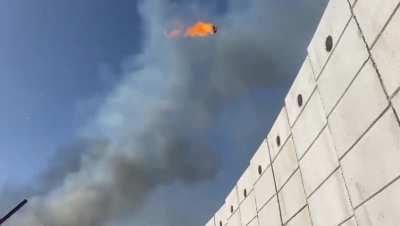 IDF soldiers trying to start fires in Lebanon using a trebuchet