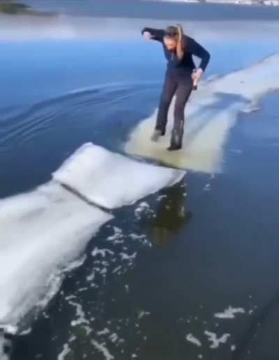 woman tries to walk on ice