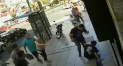Guy hits old man and gets served street justice