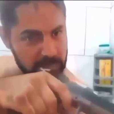 An american brushing his teeth
