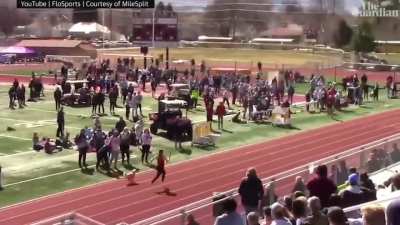 Dogo breaks loose to wins relay race at a HS track event.