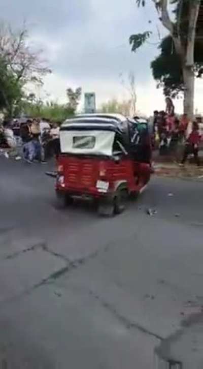 tuc tuc meets motorcycle