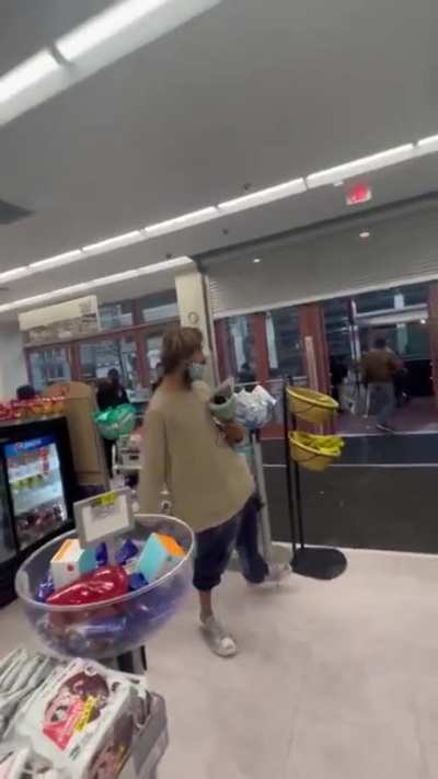 Homeless guy steals food from a store, dude filming tries to be a hero