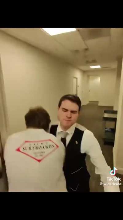 Another group of people storm into the scientology building!