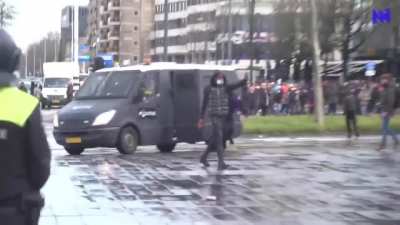 Hooligan taunts riot police