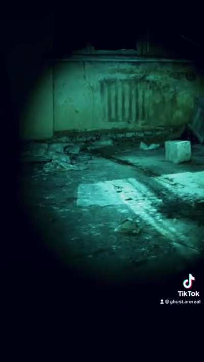 Crying man in abandoned building