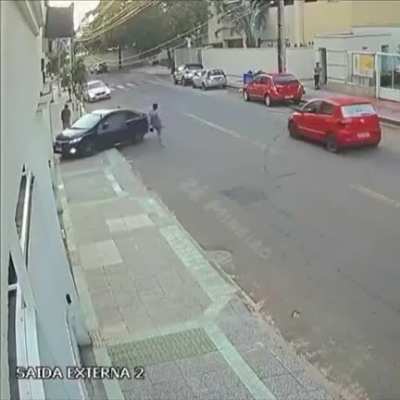 Guy crashes his Honda Civic to save a lady's phone