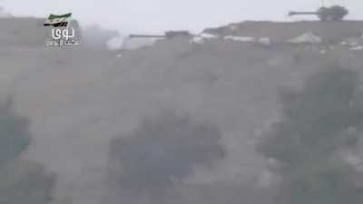 Free Syrian army tank destroys an SAA Shilka vehicle with a direct hit. Tal al-Hash, Syria. 10-2-2013.