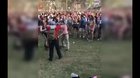 Guy is tackled at a music festival.