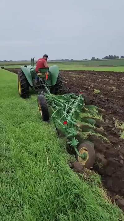 Tractor plowing the field