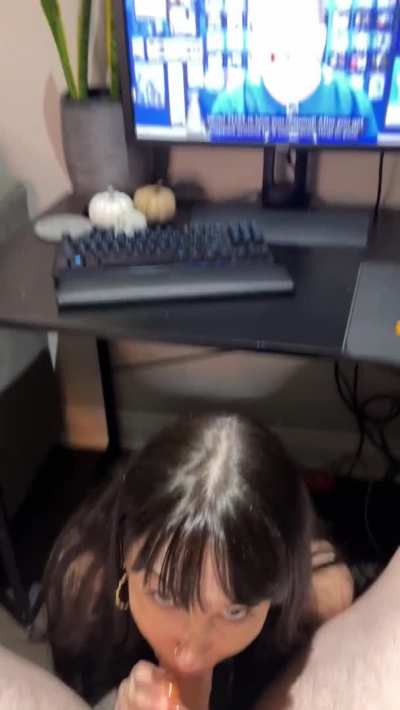 Getting his cock sucked while he watches YouTube