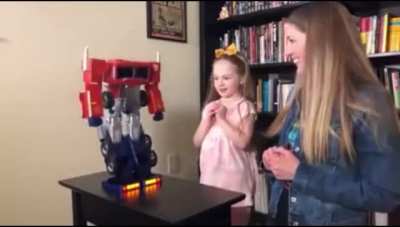 Little girl with her new toy