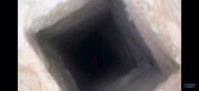 Throwing a molotov down a hole...