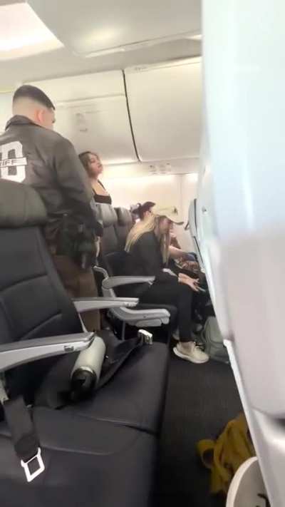 United Airlines recently made a new rule that you can't listen to audio/video without headphones. This woman ignored it, gets belligerent and is arrested