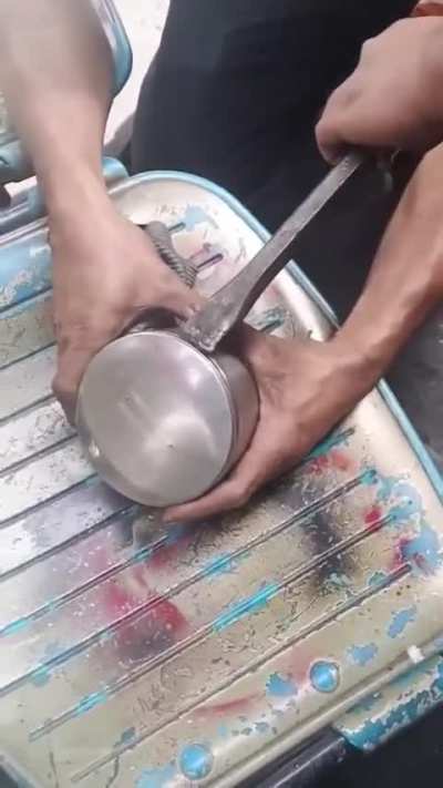 Dude removed a car part and decided it's multipurpose