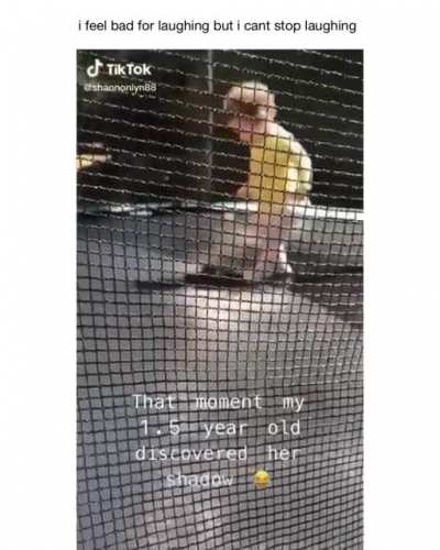 Kid discovers her shadow...