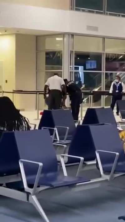 Dutch rapper gets slapped hard at an airport in Curaçao. It's rumoured that he faked his PCR test.