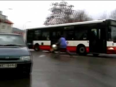 Guy threw a bucket of paint on a bus and caused an accident