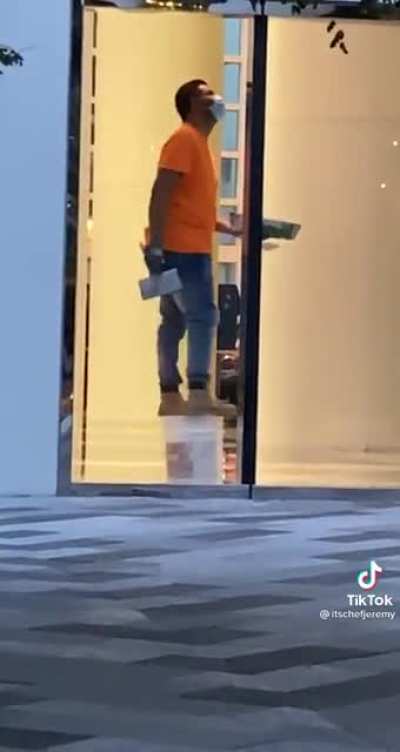 Walking on a bucket while fixing the ceiling.