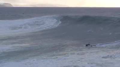 Jet Skier Saves Surfer From A Monster Wave