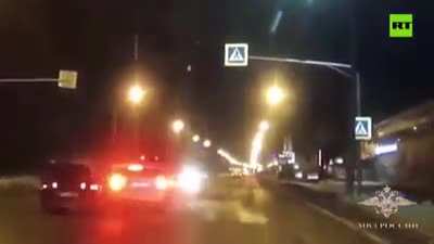 [RUSSIA] Cops in car deflect idiot from hitting a pedestrian