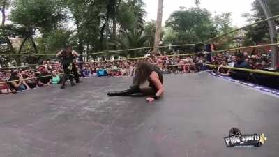 Ludark Shaitan delivers a brutal wishbone low blow to Keyra