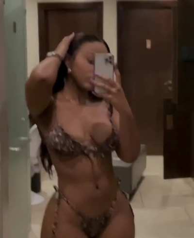 That bikini on her is super sexy.