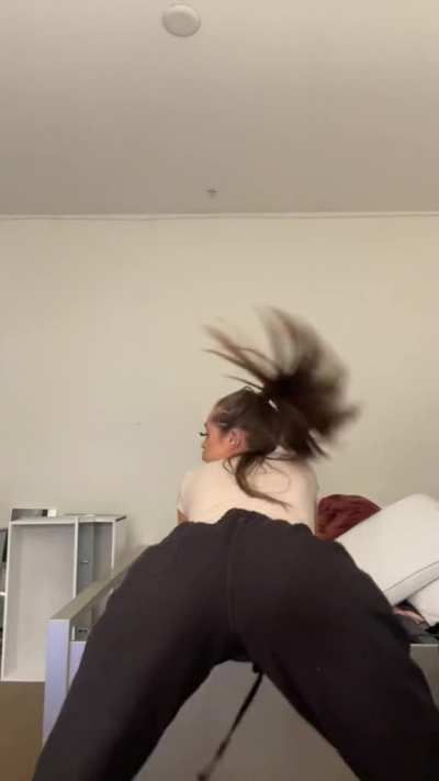 Twerking in black sweatspants