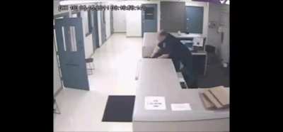 A cop is choking a black man