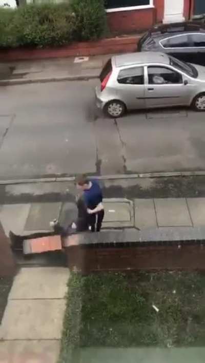 Car thief crashes into wall with a little help from a passer-by's fist.