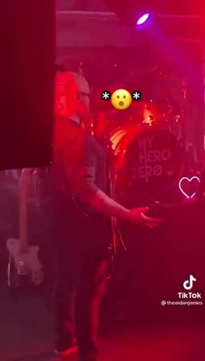 Sneaking on stage with a live band