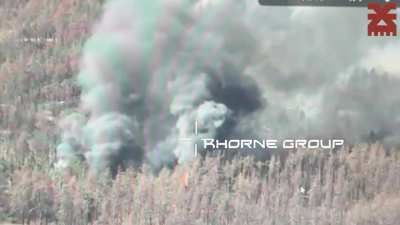 Khorne Group drone dropping thermite to set fire to Russian position in forested area. Published on September 4, 2024 (Location not mentioned)